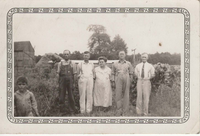 Harrison Mort Brown And Siblings ?
We "think" this is Harrison Mort Brown and some of his siblings. We believe the woman is Ada Workmok or Workman. We also believe the man on the far right side is William Brown and the second from the left may be Harrison Brown.

We believe this was taken in Dale or Huntingburg Indiana

If anyone can confirm or add additional information, please let  us know.

