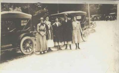 Image of Marion Leedom and Four Other Young Women
This is an image of Marion Hostetter nee Leedom, that may have been taken in the 1920's.

We are not sure if the other girls in this photo were Marion's sisters, friends or co-workers. 

 We are not sure where they were at the time this image was taken or of the family heritage of any of the other girls. If you can help identify any of the other girls in the album or their family members, please contact us.

Â© Copyright 1996-2021 American Legacies LLC
All rights reserved, This photo may NOT be used for any commercial endeavor. Unauthorized reproduction in any manner is strictly prohibited, however any relative of an individual in this photo, is welcome to print out a copy for their own personal use. 
Keywords: Marion Leedom;unknown girls;1920&#039;s cars